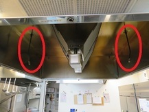 写真：厨房設備の自動消火装置1