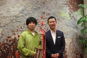 写真：ペットトリミング大会優勝報告