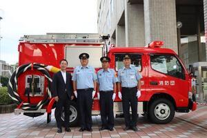 写真：消防団と市長